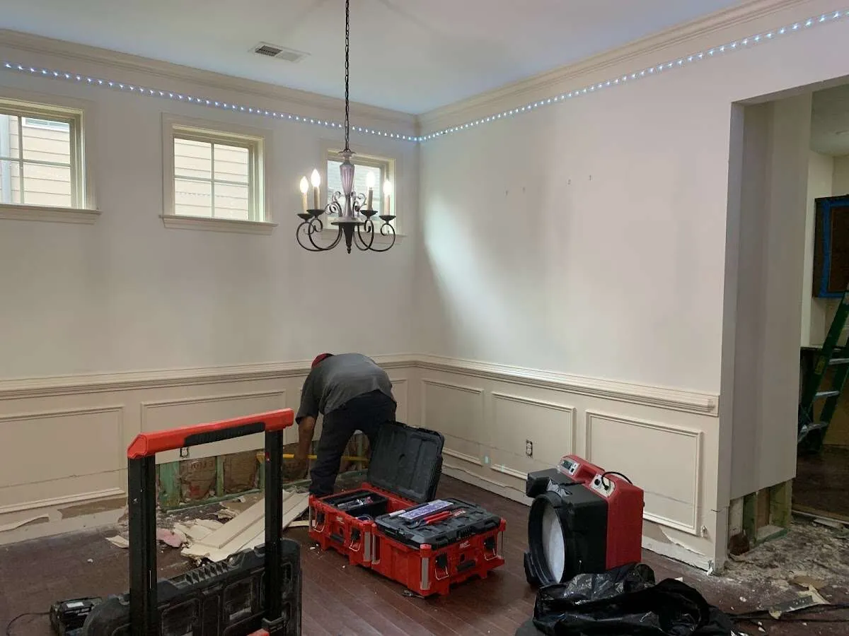 Restoration technician with professional equipment in Upper St. Clair